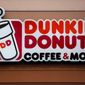 FILE - This Jan. 22, 2018, file photo shows a Dunkin&#39; Donuts logo on a shop in Mount Lebanon, Pa. The Massachusetts-based coffee and donuts empire is teaming with Post Consumer Brands to release two new breakfast cereals based on two of its most popular coffee drinks: Caramel Macchiato and Mocha Latte. The new cereals are expected to hit grocery shelves in late August 2020. (AP Photo/Gene J. Puskar, File)