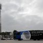 A bus carrying the Atalanta soccer team arrives at the Pina Manique stadium in Lisbon for a training session, Tuesday Aug. 11, 2020. Atalanta will face PSG in a Champions League quarterfinals match on Wednesday in Lisbon. (AP Photo/Armando Franca)