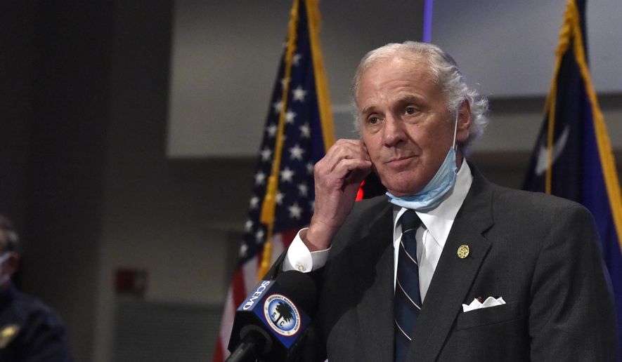 South Carolina Gov. Henry McMaster removes his mask while speaking during a COVID-19 briefing on Wednesday, July 29, 2020, in West Columbia, S.C. As of Monday, McMaster says all businesses will be allowed to be open, as long as they adhere to social distancing and capacity limits. (AP Photo/Meg Kinnard)