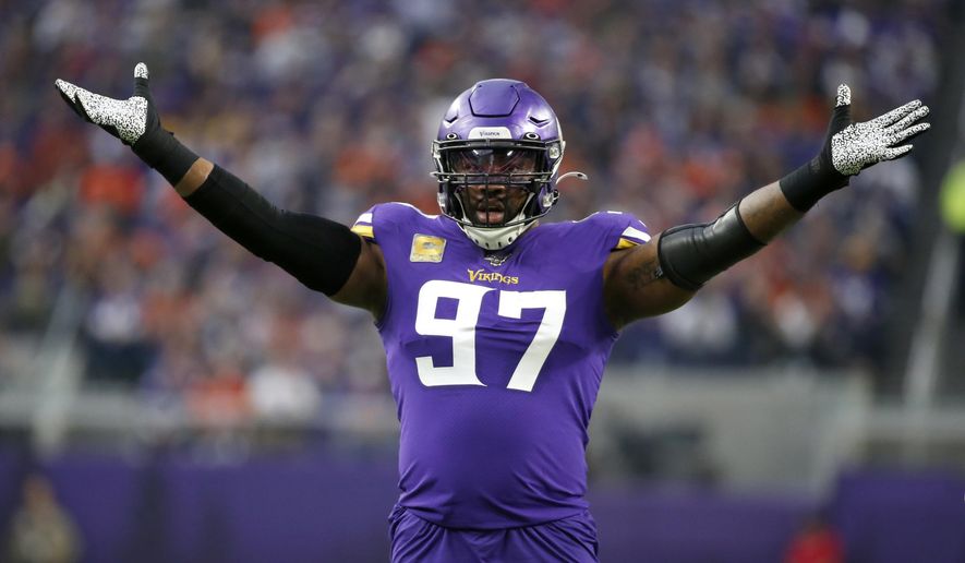 File-Minnesota Vikings defensive end Everson Griffen celebrates a sack during the first half of an NFL football game against the Denver Broncos, Sunday, Nov. 17, 2019, in Minneapolis. The Dallas Cowboys have agreed to a contract with longtime Minnesota defensive end Everson Griffen, a person with knowledge of the deal said Wednesday, Aug. 12, 2020. Griffen is the latest addition of a pass rusher with a pedigree for the Cowboys, who signed former San Francisco end Aldon Smith during the offseason.  (AP Photo/Bruce Kluckhohn, File)