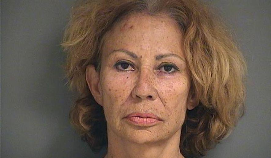 A photo provided by the Palm Beach County Sheriff's Office shows Renata Gloria Ray, who authorities say shot and wounded one woman and threatened another following a confrontation outside a grocery store Sunday afternoon, Aug. 9, 2020, in Lake Worth, Fla. Ray was arrested shortly after the shooting outside a Publix, the Palm Beach County Sheriff’s Office said. She was charged with attempted murder and aggravated assault with a firearm. (Palm Beach County Sheriff's Office via AP)