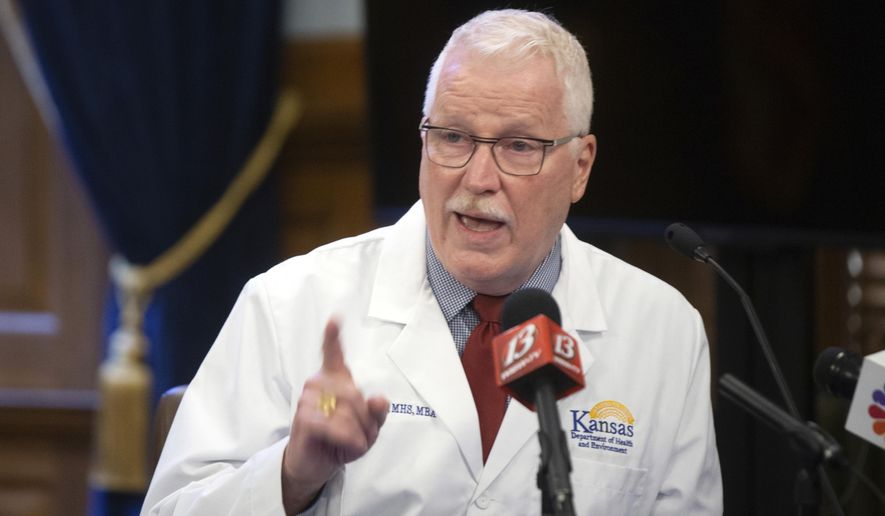 Lee Norman, Kansas secretary of health and environment, speaks to the press at the Statehouse during the coronavirus pandemic at a weekly briefing, Wednesday, Aug. 12, 2020, in Topeka, Kan. (Evert Nelson/The Topeka Capital-Journal via AP)