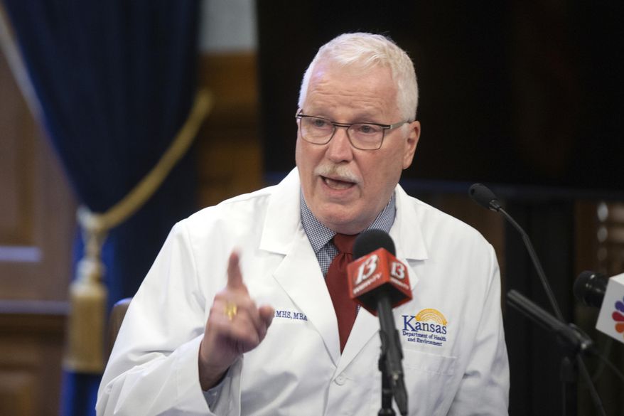 Lee Norman, Kansas secretary of health and environment, speaks to the press at the Statehouse during the coronavirus pandemic at a weekly briefing, Wednesday, Aug. 12, 2020, in Topeka, Kan. (Evert Nelson/The Topeka Capital-Journal via AP)