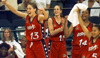 FILE - In this July 27, 1996, file photo, USA&#39;s Rebecca Lobo (13) leads the team off the bench to cheer at the end of their 96-79 victory over Australia in women&#39;s Olympic basketball at the Georgia Dome in Atlanta. From left are Lobo, Katy Steding (11), Venus Lacey (14), and Dawn Staley (5). (AP Photo/Elise Amendola, File)