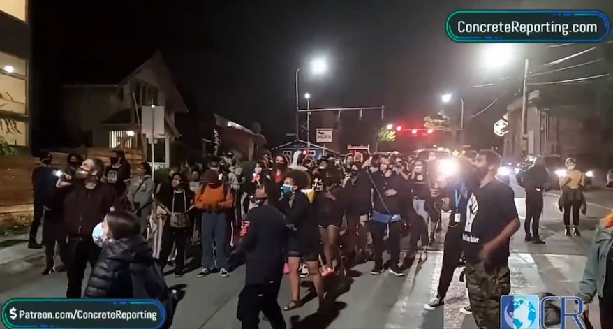 Black Lives Matter activists in Seattle demand homeowners give up their property as a form of reparations, Aug. 12, 2020. The march through neighborhoods was live-streamed by Concrete Reporting via the Periscope app. (Image: Periscope app live stream, Concrete Reporting, video screenshot) 