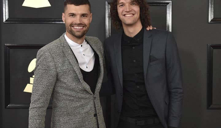 FILE - This Feb. 12, 2017 file photo shows Joel Smallbone, left, and Luke Smallbone of for King &amp;amp; Country arriving at the 59th annual Grammy Awards at the Staples Center in Los Angeles.  Christian artists Zach Williams and for King &amp;amp; Country are the leading artist nominees at the 2020 Dove Awards, while rapper Kanye West and singer Gloria Gaynor earned their first ever nominations.(Photo by Jordan Strauss/Invision/AP, File)