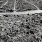 This aerial photo taken on March 9, 1945, shows the industrial section of Tokyo along the Sumida River. The nuclear bombs dropped by the United States on Hiroshima and Nagasaki in August 1945 secured Japan&#39;s surrender and ended World War II. In Japan, war orphans were punished for surviving. They were bullied. They were called trash, sometimes rounded up by police and put in cages. Some were sent to institutions or sold for labor. They were targets of abuse and discrimination. Now, 75 years after the war&#39;s end, some are revealing their untold stories of recovery and pain, underscoring Japan’s failure to help its own people. (AP Photo, File)