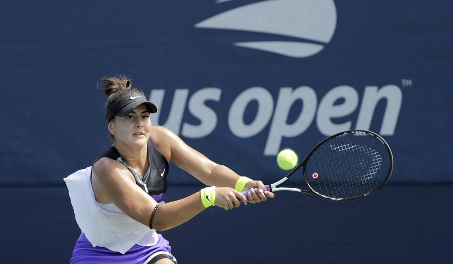FILE - In this Aug, 27, 2019, file photo, Bianca Andreescu, of Canada, returns a shot to Katie Volynets, of the United States, during the first round of the US Open tennis tournament in New York. Reigning U.S. Open champion Bianca Andreescu pulled out of the Grand Slam tournament Thursday, Aug. 13, 2020, saying the coronavirus pandemic prevented her from properly preparing for competition. (AP Photo/Frank Franklin II, File)