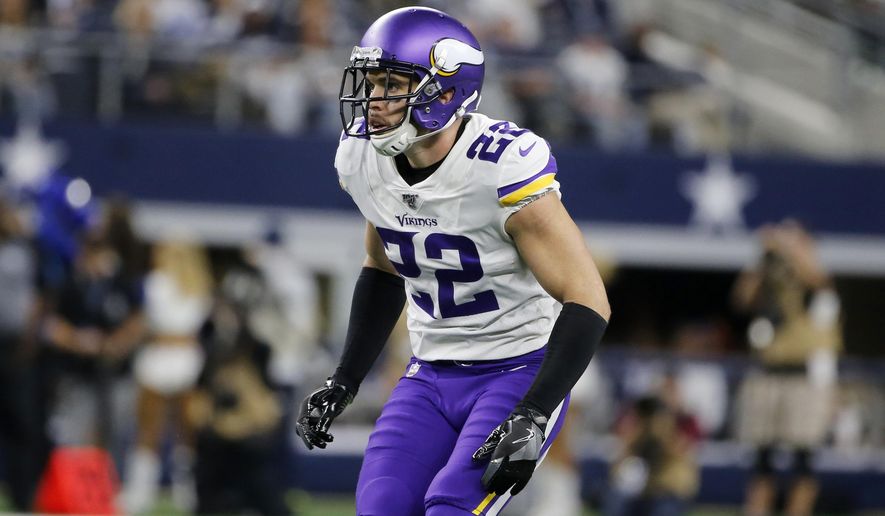 FILE - In this Nov. 1, 2019, file photo, Minnesota Vikings free safety Harrison Smith (22) defends against the Dallas Cowboys during an NFL football game in Arlington, Texas. No team in the NFC is spending more salary cap space on safeties than the Minnesota Vikings, who will be counting on Harrison Smith and Anthony Harris to support a secondary in transition after the departure of their top three cornerbacks from last season. (AP Photo/Michael Ainsworth, File)