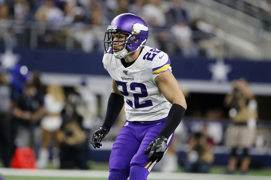 FILE - In this Nov. 1, 2019, file photo, Minnesota Vikings free safety Harrison Smith (22) defends against the Dallas Cowboys during an NFL football game in Arlington, Texas. No team in the NFC is spending more salary cap space on safeties than the Minnesota Vikings, who will be counting on Harrison Smith and Anthony Harris to support a secondary in transition after the departure of their top three cornerbacks from last season. (AP Photo/Michael Ainsworth, File)