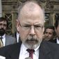 In this April 25, 2006, file photo, U.S. Attorney John Durham speaks to reporters on the steps of U.S. District Court in New Haven, Conn. (AP Photo/Bob Child, File) ** FILE **