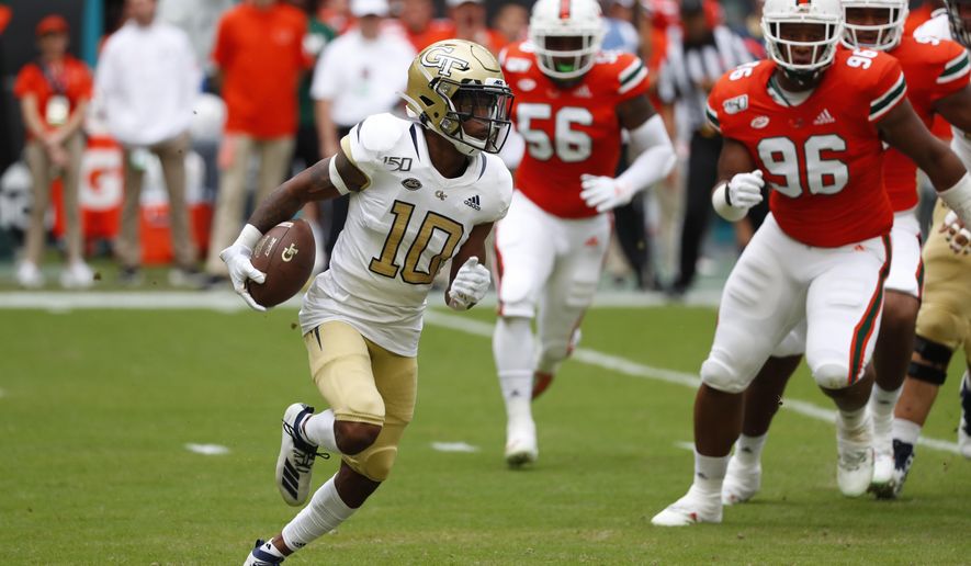 FILE - In this Saturday, Oct. 19, 2019, file photo, Georgia Tech wide receiver Ahmarean Brown runs for yardage during the first half of an NCAA college football game against Miami, in Miami Gardens, Fla. The Yellow Jackets will need big years from their receivers if they are to improve upon last season's unit, which finished 124th in scoring and fourth-worst among FBS schools in total offense.(AP Photo/Wilfredo Lee, File)