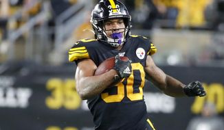 FILE - In this Oct. 28, 2019, file photo, Pittsburgh Steelers running back James Conner (30) plays against the Miami Dolphins in an NFL football game, in Pittsburgh. Conner wants to prove he can finish a season healthy. (AP Photo/Don Wright, File)