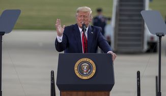 President Donald Trump speaks at an event at the Wittman Regional Airport Monday, Aug. 17, 2020, in Oshkosh, Wis. (AP Photo/Mike Roemer)