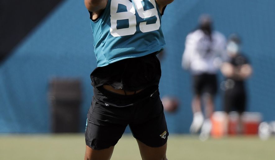 Jacksonville Jaguars tight end Josh Oliver performs a drill during an NFL football workout, Wednesday, Aug. 12, 2020, in Jacksonville, Fla. (AP Photo/John Raoux)