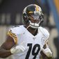 FILE - In this Sunday, Oct. 13, 2019, file photo, Pittsburgh Steelers wide receiver JuJu Smith-Schuster enters the stadium before an NFL football game against the Los Angeles Chargers, in Carson, Calif. Three years ago, the Steelers wide receiver was the youngest player in the league. Now he&#39;s the most experienced wide receiver in the locker room and finds himself facing an uncertain future entering the final year of his contract. (AP Photo/Kyusung Gong, File)