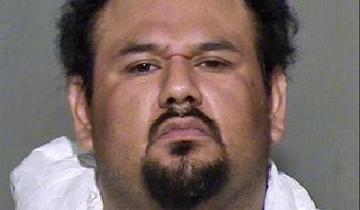 This undated law enforcement booking photo provided by the Maricopa County, Ariz., Sheriff&#39;s Office shows suspect Apolinar Altamirano, who is charged with murder in the 2015 shooting death of a convenience store clerk in a Phoenix suburb. The Arizona Supreme Court has reversed a lower-court ruling that barred prosecutors from seeking the death penalty against Altamirano because he was intellectually disabled. Altamirano has pleaded not guilty to the charges. (Maricopa County Sheriff&#39;s Office via AP)