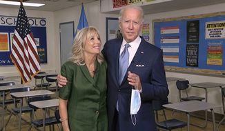 In this image from video, Jill Biden is joined by her husband, Democratic presidential candidate former Vice President Joe Biden, after speaking during the second night of the Democratic National Convention on Tuesday, Aug. 18, 2020. (Democratic National Convention via AP)