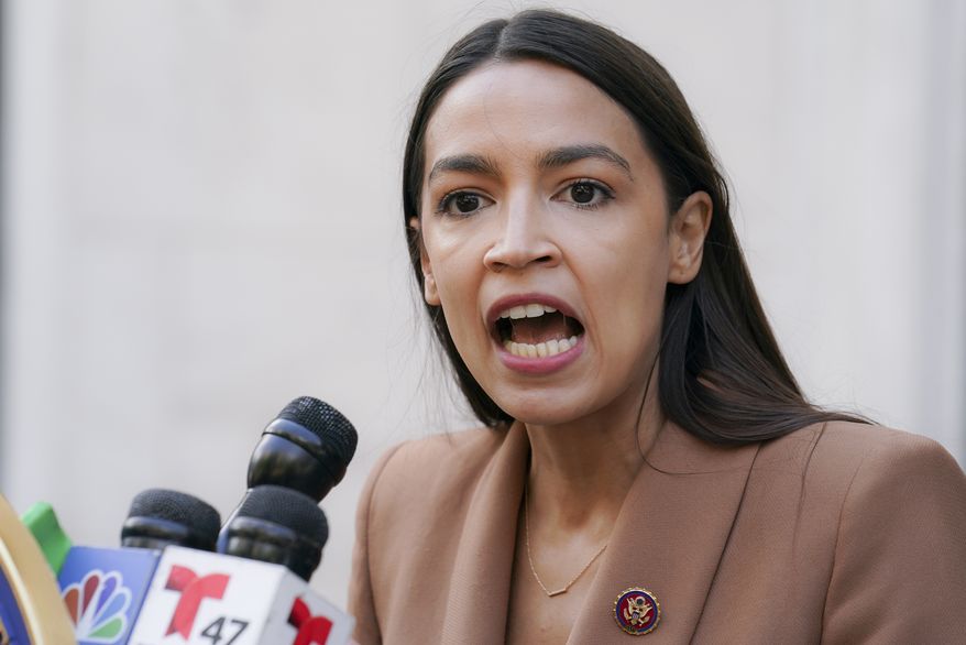 Rep. Alexandria Ocasio-Cortez, D-N.Y., speaks during a news conference outside the United States Postal Service Jamaica station, Tuesday, Aug. 18, 2020, in the Queens borough of New York. (AP Photo/John Minchillo)  **FILE**