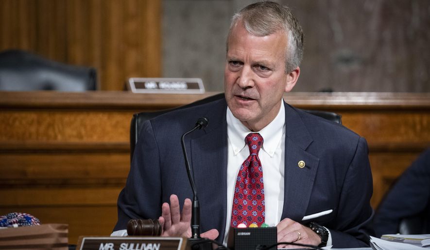 FILE - In this May 7, 2020, file photo, Sen. Dan Sullivan, R-Alaska, testifies during a hearing on Capitol Hill in Washington. Sen. Sullivan, an Alaska Republican, is unopposed in the Alaska Republican Primary on Aug. 18, 2020. Sullivan, who is seeking a second term, will face the winner of the Democratic primary, which includes the leading candidate, Al Gross, who is running as nonpartisan. (Al Drago/Pool via AP, File)