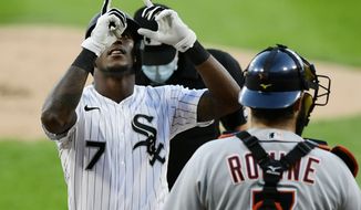 Chicago White Sox&#39;s Tim Anderson (7) celebrates at home plate after hitting a solo home run during the first inning of a baseball game against the Detroit Tigers Tuesday, Aug. 18, 2020, in Chicago. (AP Photo/Paul Beaty)