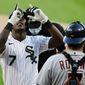 Chicago White Sox&#39;s Tim Anderson (7) celebrates at home plate after hitting a solo home run during the first inning of a baseball game against the Detroit Tigers Tuesday, Aug. 18, 2020, in Chicago. (AP Photo/Paul Beaty)