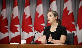 Canada&#39;s Deputy Prime Minister Chrystia Freeland speaks during a news conference in Toronto, Friday, Aug. 7, 2020.  (Cole Burston/The Canadian Press via AP)