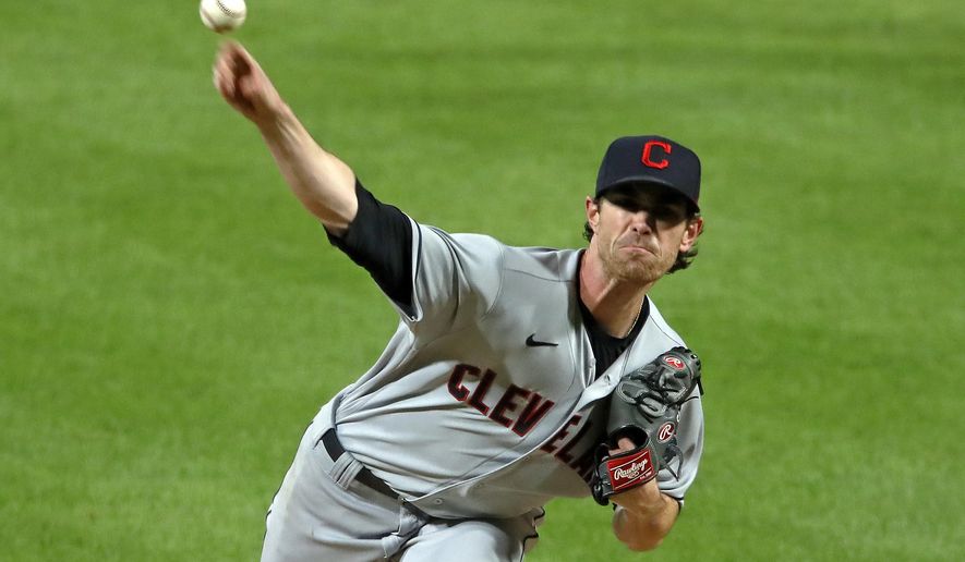 Cleveland Indians starting pitcher Shane Bieber delivers during the sixth inning of a baseball game against the Pittsburgh Pirates in Pittsburgh, Thursday, Aug. 20, 2020. The Indians won 2-0. (AP Photo/Gene J. Puskar)