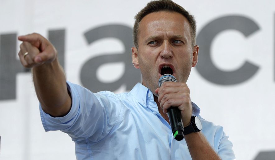 In this Saturday, July 20, 2019, file photo Russian opposition activist Alexei Navalny gestures while speaking to a crowd during a political protest in Moscow, Russia. He was placed on a ventilator in a hospital intensive care unit in Siberia after falling ill from suspected poisoning during a flight, his spokeswoman said Thursday, Aug. 20, 2020. (AP Photo/Pavel Golovkin, File)