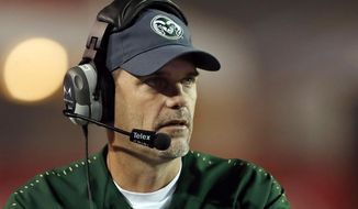 FILE - In this Oct. 11, 2019, file photo, Colorado State coach Mike Bobo watches from the sideline during the second half of an NCAA college football game against New Mexico in Albuquerque, N.M. First-year South Carolina assistant Mike Bobo said Thursday, Aug. 20, 2020, he was offended by allegations that anyone on his former Colorado State staff or team say they were abused or treated with racial insensitivity. Bobo had been Colorado State&#39;s coach the past five years before getting hired at South Carolina last December.  (AP Photo/Andres Leighton, File)