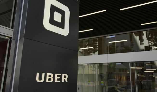 FILE - In this June 21, 2017, file photo, is a building that houses offices of Uber, in San Francisco. A former Uber executive was charged Thursday, Aug. 20, 2020, in federal court on allegations that he arranged $100,000 in a hush-money payment to hackers who stole the personal data of about 57 million of the ride-hailing service&#x27;s users and drivers and then sought to cover up the massive 2016 breach, authorities said. (AP Photo/Eric Risberg, File)