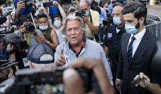 President Donald Trump&#39;s former chief strategist Steve Bannon leaves federal court, Thursday, Aug. 20, 2020, after pleading not guilty to charges that he ripped off donors to an online fundraising scheme to build a southern border wall. (AP Photo/Craig Ruttle)