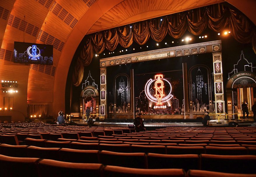 FILE - A view of the stage appears prior to the start of the 73rd annual Tony Awards at Radio City Music Hall in New York on June 9, 2019. Tony Award Productions said Friday that the celebration of live theater will be digital but offered no date or streaming platform. Final eligibility determinations will be made by the Tony Awards Administration Committee “in the coming days.” Broadway theaters abruptly closed on March 12, knocking out all shows — including 16 that were still scheduled to open. (Photo by Charles Sykes/Invision/AP, File)