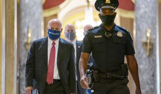 Postmaster General Louis DeJoy, left, is escorted to House Speaker Nancy Pelosi&#39;s office on Capitol Hill in Washington, Wednesday, Aug. 5, 2020.  Facing public backlash, DeJoy is set to testify Friday about disruptions in mail delivery. (AP Photo/Carolyn Kaster)