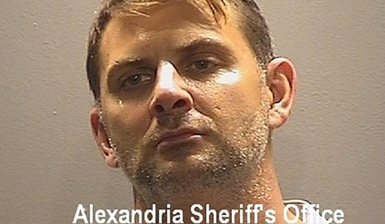 This booking photo provided by the Alexandria, Va, Sheriff&#39;s Office, shows Peter Debbins, a former Army Green Beret, who was arrested Friday, Aug. 21, 2020, for allegedly conspiring with Russian intelligence operatives to provide them with United States national defense information. (Alexandria Sheriff&#39;s Office via AP)