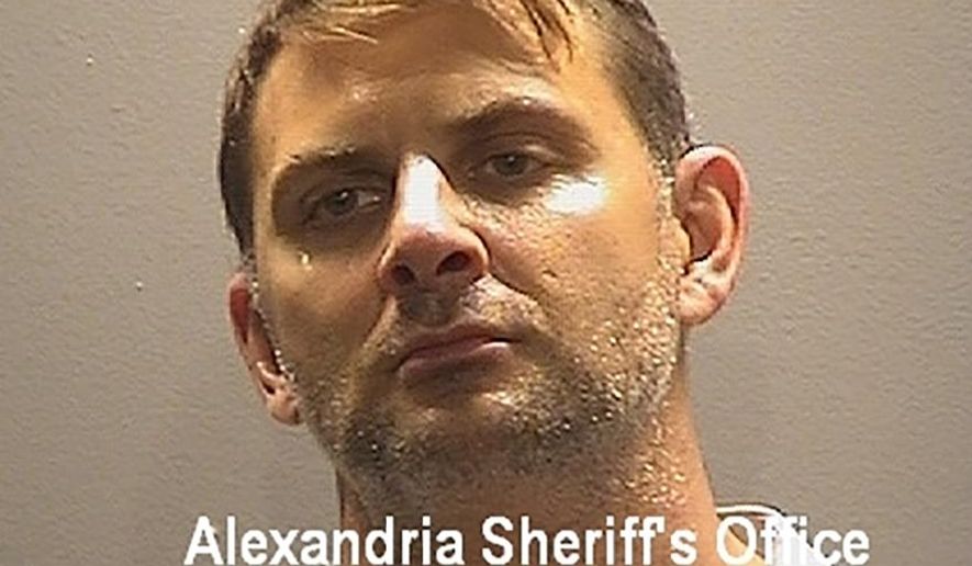This booking photo provided by the Alexandria, Va, Sheriff&#39;s Office, shows Peter Debbins, a former Army Green Beret, who was arrested Friday, Aug. 21, 2020, for allegedly conspiring with Russian intelligence operatives to provide them with United States national defense information. (Alexandria Sheriff&#39;s Office via AP)
