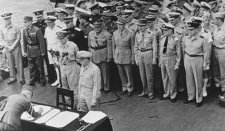 FILE - General of the Army Douglas MacArthur, Supreme Allied Commander, and General Wainwright, who surrendered to the Japanese after Bataan and Corregidor, witness the formal Japanese surrender signatures aboard the USS Missouri in Tokyo Bay on Sept. 2, 1945. Several dozen aging U.S. veterans, including some who were in Tokyo Bay as swarms of warplanes buzzed overhead and nations converged to end World War II, will gather on the battleship in Pearl Harbor in September to mark the 75th anniversary of Japan&#39;s surrender. (AP Photo, File)