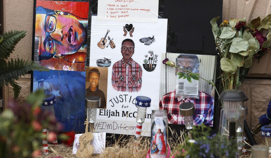 FILE - In this July 3, 2020, file photo, a makeshift memorial stands at a site across the street from where Elijah McClain was stopped by police officers while walking home in Aurora, Colo. A drug called ketamine that's injected as a sedative during arrests has drawn new scrutiny since a young Black man named Elijah McClain died in suburban Denver. An analysis by The Associated Press of policies on ketamine and cases where it was used nationwide uncovered a lack of police training, conflicting medical standards and nonexistent protocols that have resulted in hospitalizations and even deaths. (AP Photo/David Zalubowski, File)