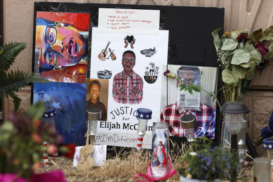 FILE - In this July 3, 2020, file photo, a makeshift memorial stands at a site across the street from where Elijah McClain was stopped by police officers while walking home in Aurora, Colo. A drug called ketamine that&#39;s injected as a sedative during arrests has drawn new scrutiny since a young Black man named Elijah McClain died in suburban Denver. An analysis by The Associated Press of policies on ketamine and cases where it was used nationwide uncovered a lack of police training, conflicting medical standards and nonexistent protocols that have resulted in hospitalizations and even deaths. (AP Photo/David Zalubowski, File)