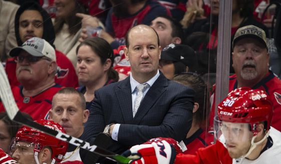  In this Jan. 16, 2020 file photo, Washington Capitals head coach Todd Reirden watches during the second period of an NHL hockey game against the New Jersey Devils in Washington. The Washington Capitals have fired Reirden after a second consecutive first-round exit in the playoffs. General manager Brian MacLellan announced the move Sunday, Aug. 23 three days after the Capitals lost to former coach Barry Trotz’s New York Islanders in a five-game series. (AP Photo/Al Drago, File)  **FILE**