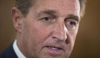 FILE - In this Dec. 6, 2018 file photo Sen. Jeff Flake, R-Ariz., a member of the Senate Foreign Relations Committee, speaks with reporters on Capitol Hill in Washington. Flake is backing Democrat Joe Biden for president. Flake on Monday, Aug. 24, 2020, tried to make a case to conservatives to deny Donald Trump a second term on the opening day of the GOP convention. He decried a culture of name-calling, tribalism and conspiracy theories. He says: &amp;quot;Character matters. Decency matters. Civility never goes out of style.&amp;quot; (AP Photo/J. Scott Applewhite, File)