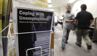 In this July 20, 2010, file photo, people arrive to seek employment opportunities at a JobTrain office in Menlo Park, Calif. (AP Photo/Paul Sakuma, File)