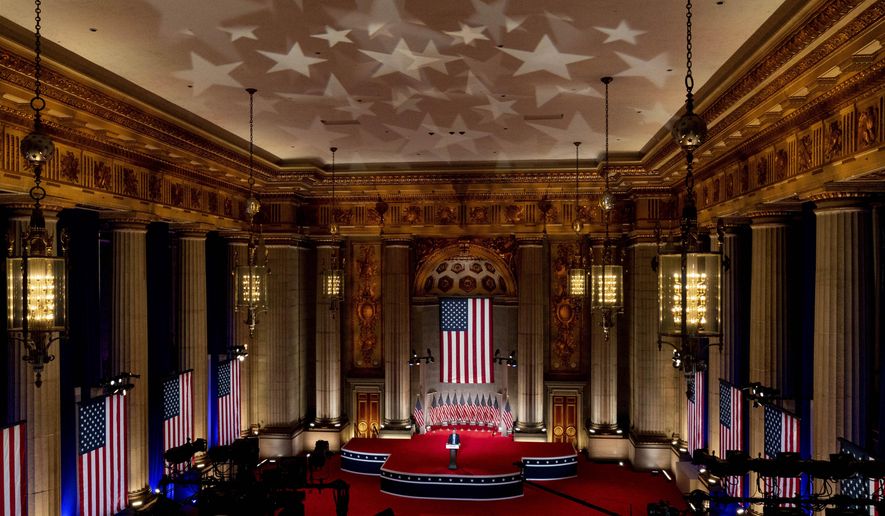 Eric Trump, the son of President Donald Trump, tapes his speech for the second day of the Republican National Convention from the Andrew W. Mellon Auditorium in Washington, Tuesday, Aug. 25, 2020. (AP Photo/Andrew Harnik)