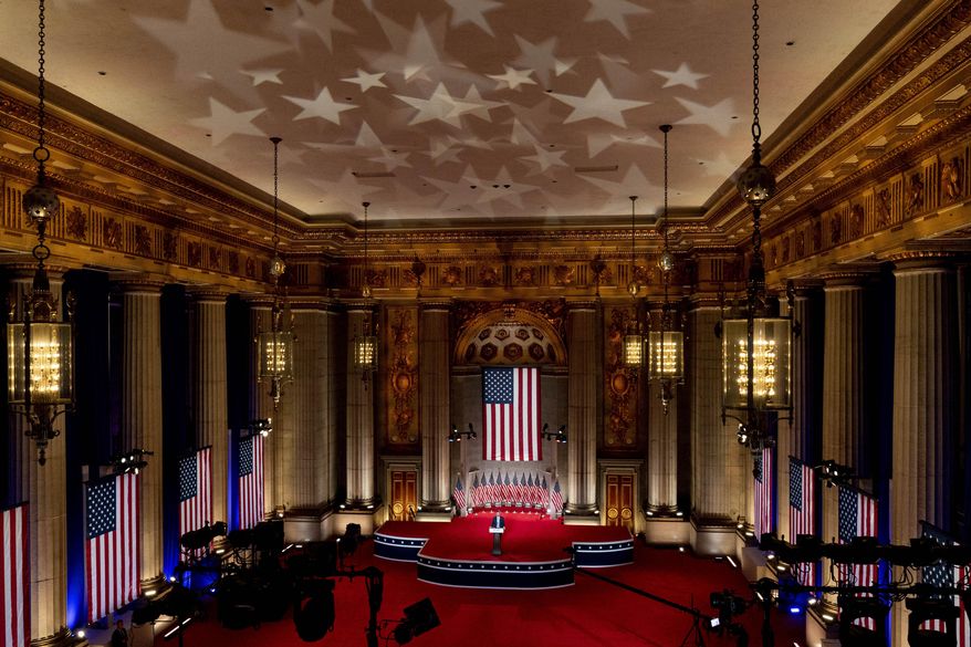 Eric Trump, the son of President Donald Trump, tapes his speech for the second day of the Republican National Convention from the Andrew W. Mellon Auditorium in Washington, Tuesday, Aug. 25, 2020. (AP Photo/Andrew Harnik)