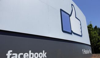 This July 16, 2013 file photo shows a sign at Facebook headquarters in Menlo Park, Calif. (AP Photo/Ben Margot, File)  **FILE**