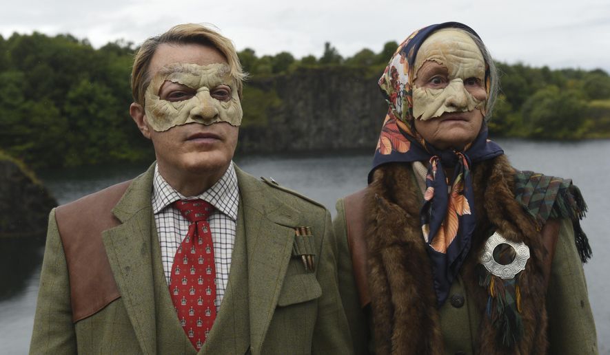 This image released by Amazon Studios shows Eddie Izzard, left, and Georgie Glen in a scene from "Get Duked!" a wild satire about some teenage stoners on a camping competition in the Scottish Highlands who discover they're being hunted. (Amazon Studios via AP)