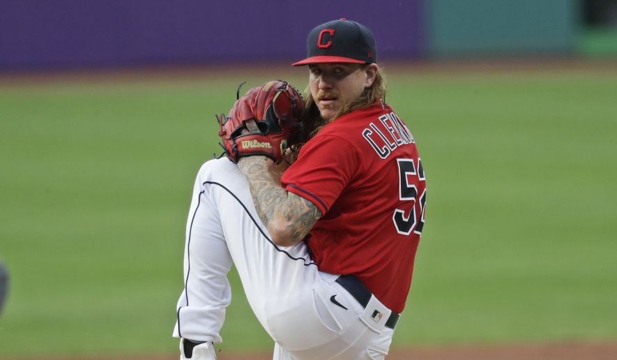Cleveland Indians starting pitcher Mike Clevinger delivers in the first inning in a baseball game against the Minnesota Twins, Wednesday, Aug. 26, 2020, in Cleveland. (AP Photo/Tony Dejak) **FILE**