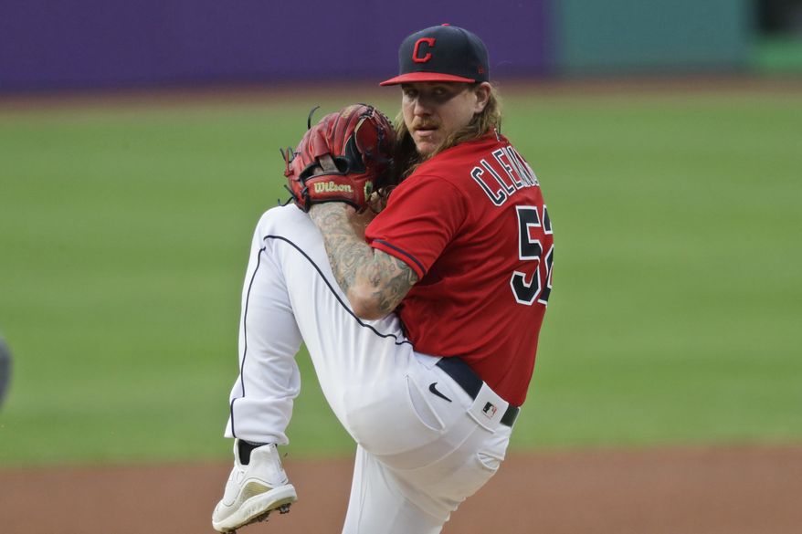 Cleveland Indians starting pitcher Mike Clevinger delivers in the first inning in a baseball game against the Minnesota Twins, Wednesday, Aug. 26, 2020, in Cleveland. (AP Photo/Tony Dejak) **FILE**