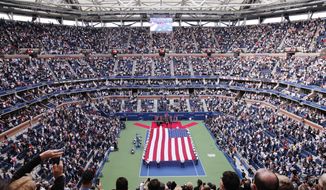 FILER - In this Sept. 10, 2017, file photo, cadets from the West Point military academy present the American flag across the court at Arthur Ashe Stadium before the start of the men&#x27;s singles final of the U.S. Open tennis tournament, between Rafael Nadal and Kevin Anderson, in New York. The 2020 U.S. Open tennis tournament is scheduled for Monday, Aug. 31-Sunday, Sept. 13. (AP Photo/Seth Wenig, File)