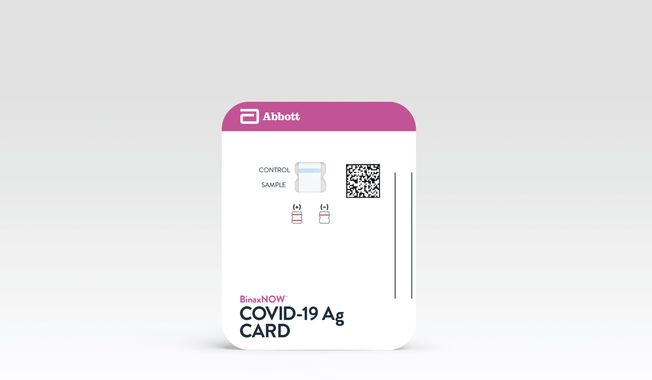 This image provided by Abbott Laboratories in August 2020 shows the company&#x27;s BinaxNOW rapid COVID-19 nasal swab test. The Food and Drug Administration on Wednesday, Aug. 26, 2020, authorized BinaxNOW, the first rapid coronavirus test that doesn’t need any special computer equipment to get results.  (Abbott Laboratories via AP)